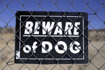 How does a beware of dog sign affect my claim